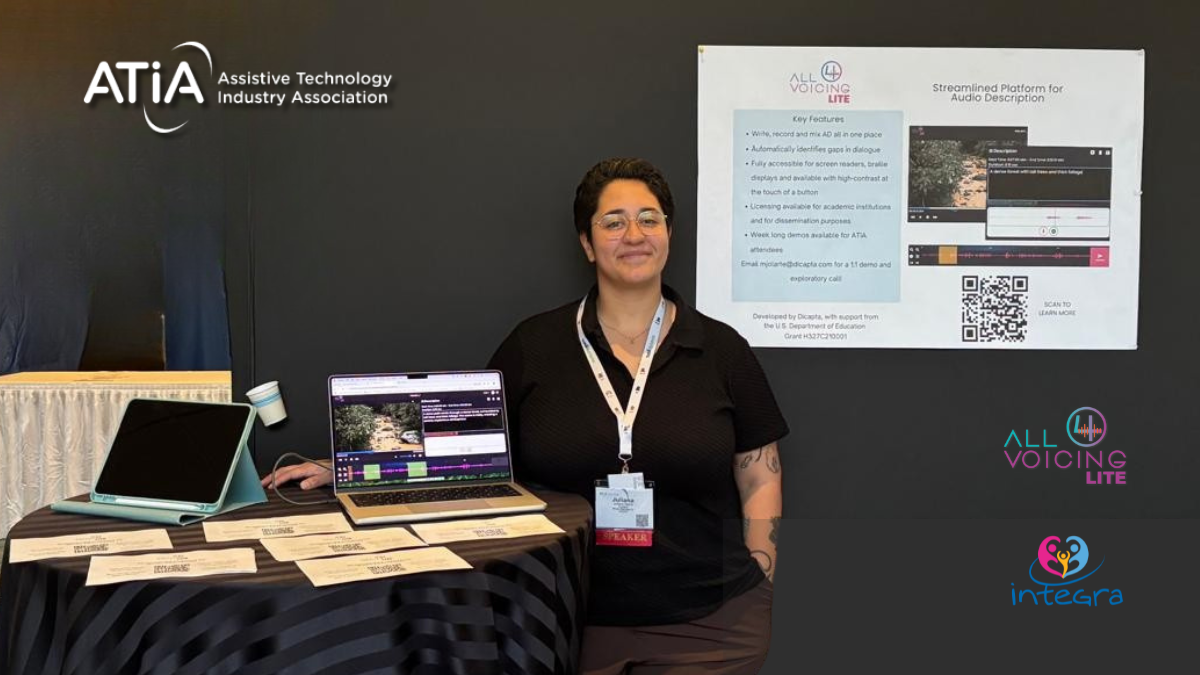 Juliana Olarte, a member of Dicapta's team, at an exhibition booth presenting "All Voicing Lite," an audio description platform, at the ATiA conference