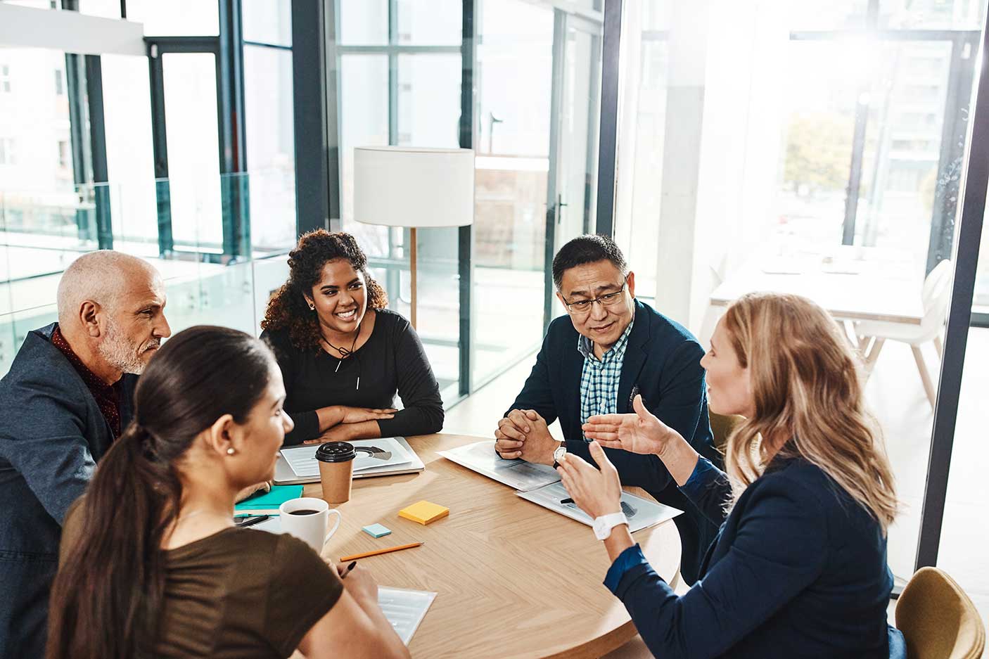 Shot of a group of businesspeople having a meeting in an office