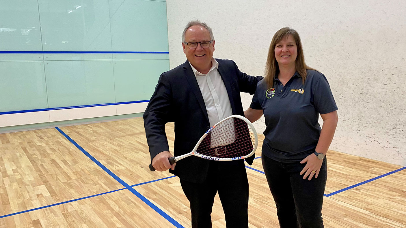 Sport and Recreation Minister David Templeman with Squash WA General Manager Leigh Kaye on a squash court.