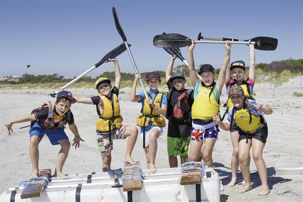 Students having a go at raft building