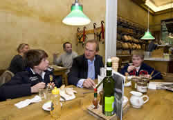 Father and children at meal together