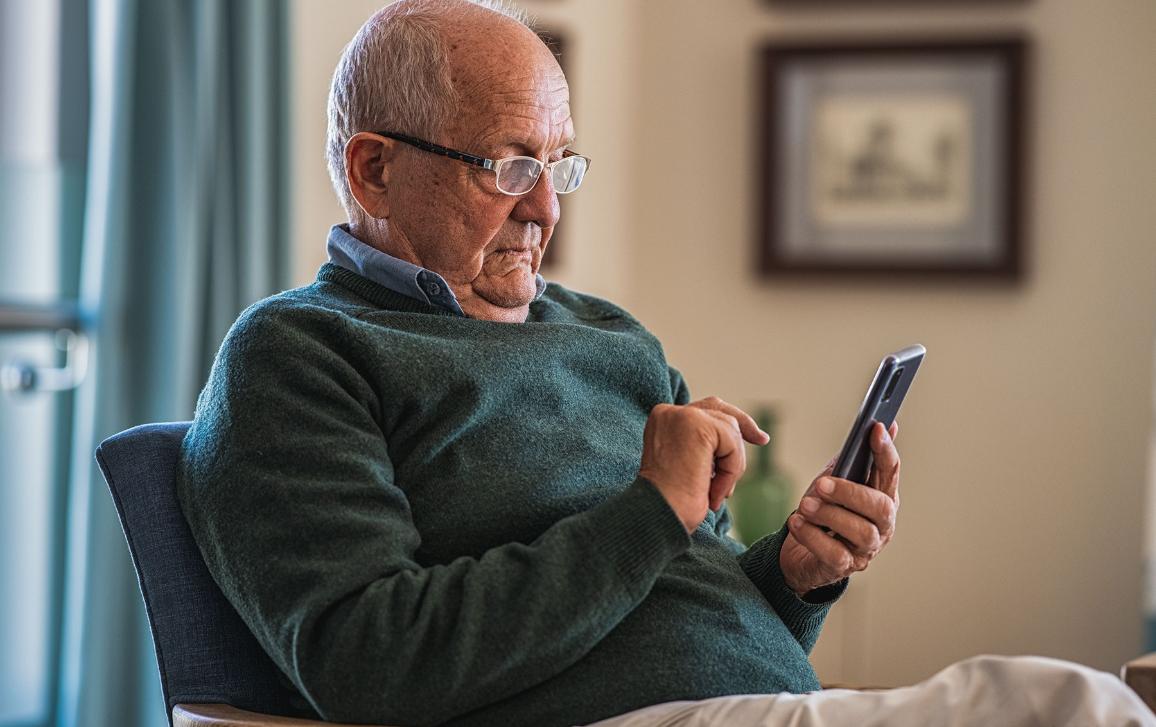 Man looking at his mobile phone