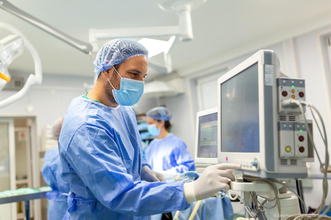 Medical ventilator being monitored by anaesthetist