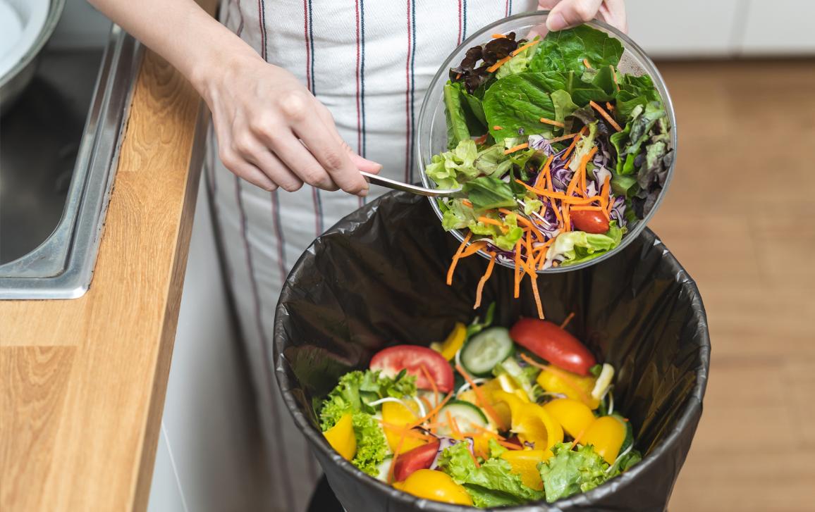 Food waste environment concept, people throwing food garbage into bin prepare to decompose.