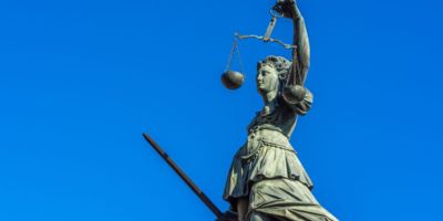 Lady Justice Statue - iStock.com/MarkusBeck