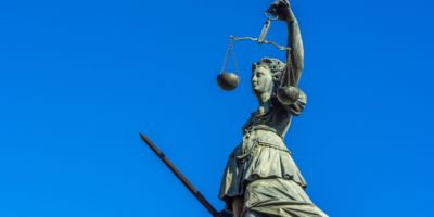 Lady Justice Statue - iStock.com/MarkusBeck