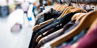 Clothes hanging in a store