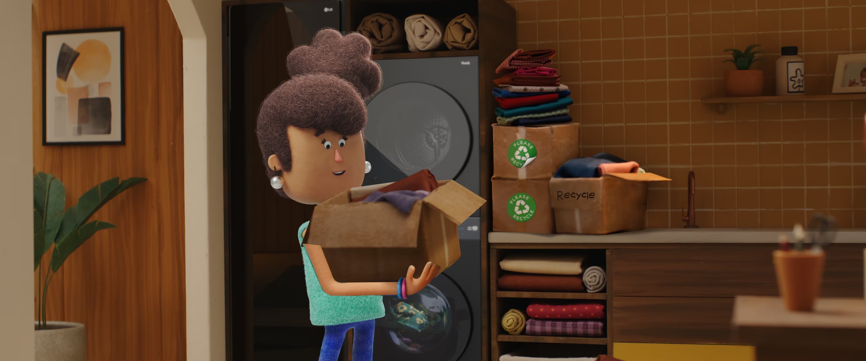 A girl holding a box of clothes