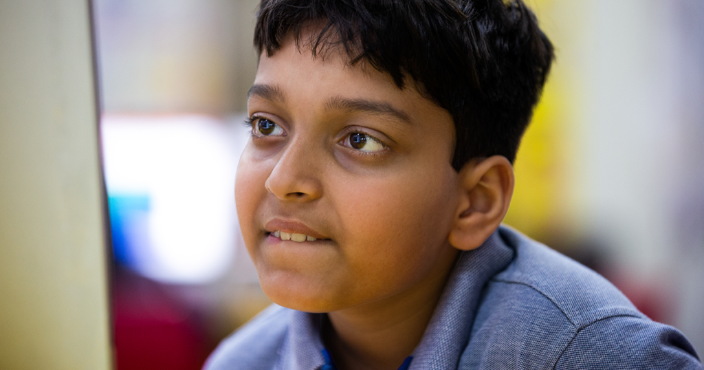 Image of a boy in a classroom.