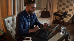 A man working and interacting with his PC.