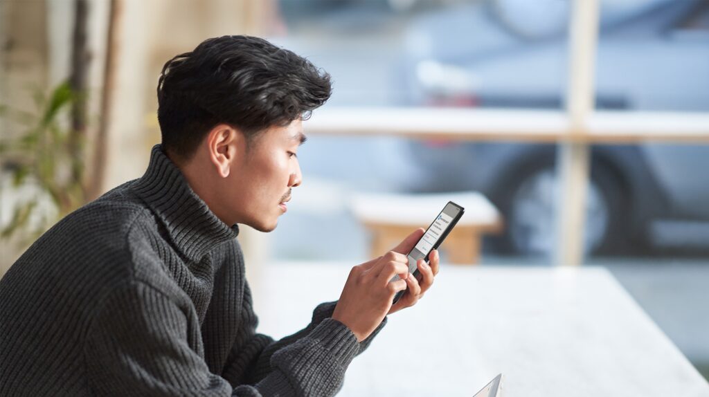 A man looking at his phone