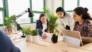 Employees at Microsoft collaborate in a Microsoft office.