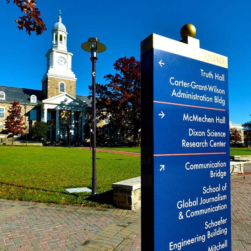 directions sign on the academic quad