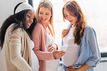 multicultural group of pregnant women