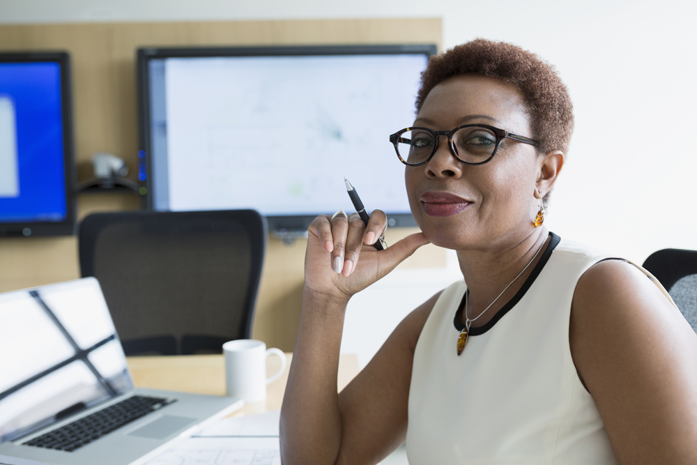 A woman sitting at a desk