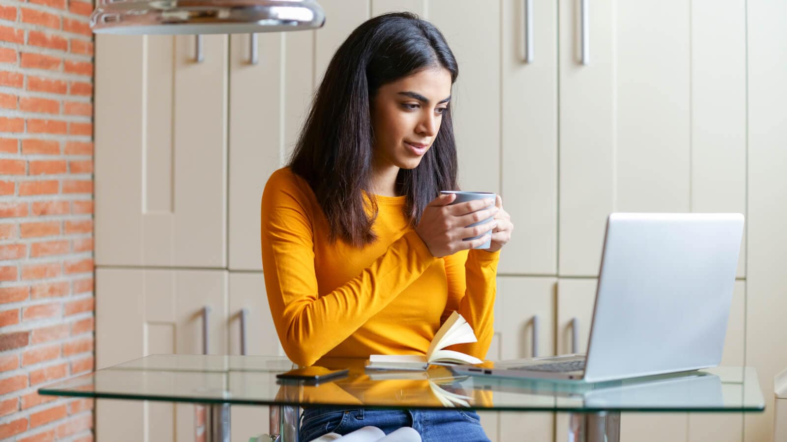 student looking at laptop