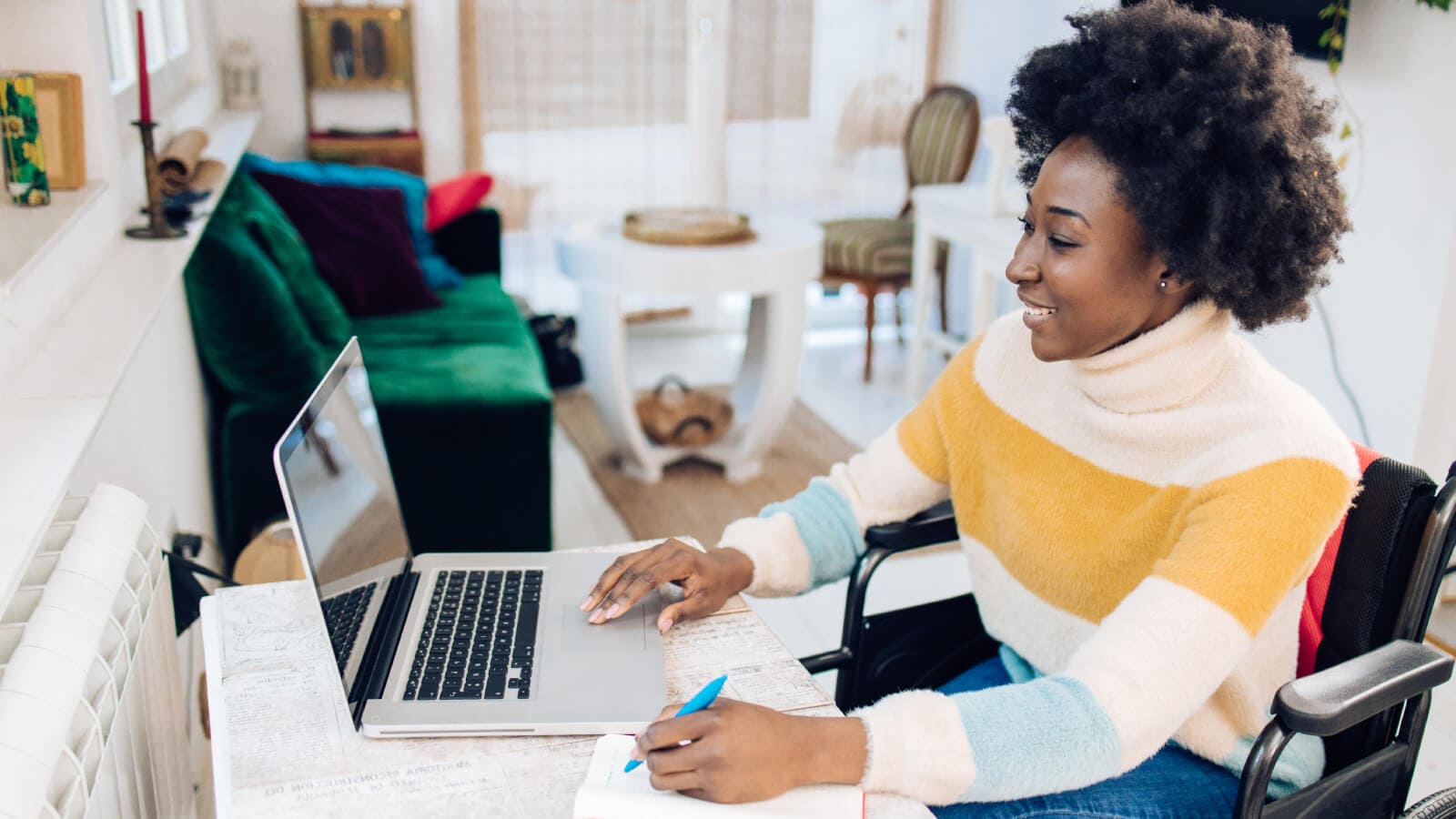 Woman working on laptop from home