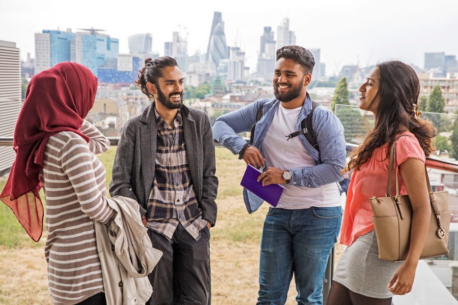 Students with skyline in background