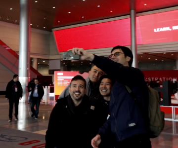 Group of four people taking a selfie together at Red Hat Summit