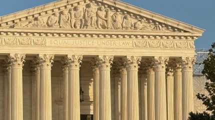 Supreme Court building in gold light