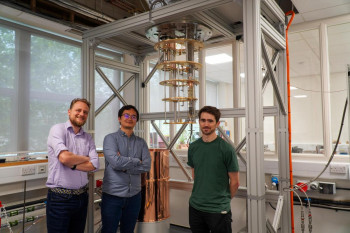 From left to right: Professor Jan Mol, Dr. Junjie Liu, Dr. James Thomas with the diluted refrigerator ProteoxMX.