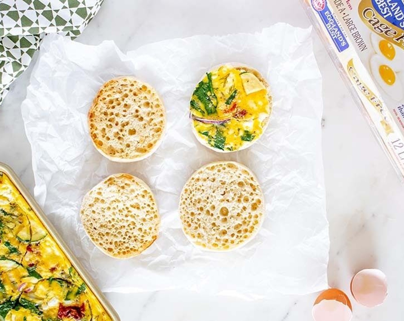 step 7 To make sandwiches, using a round cookie cutter or the rim of a drinking glass, cut 6 circles that are the same size as English muffins. Or you can cut the sheet pan eggs into 8 rectangles and eat them on English Muffins (6) that way.