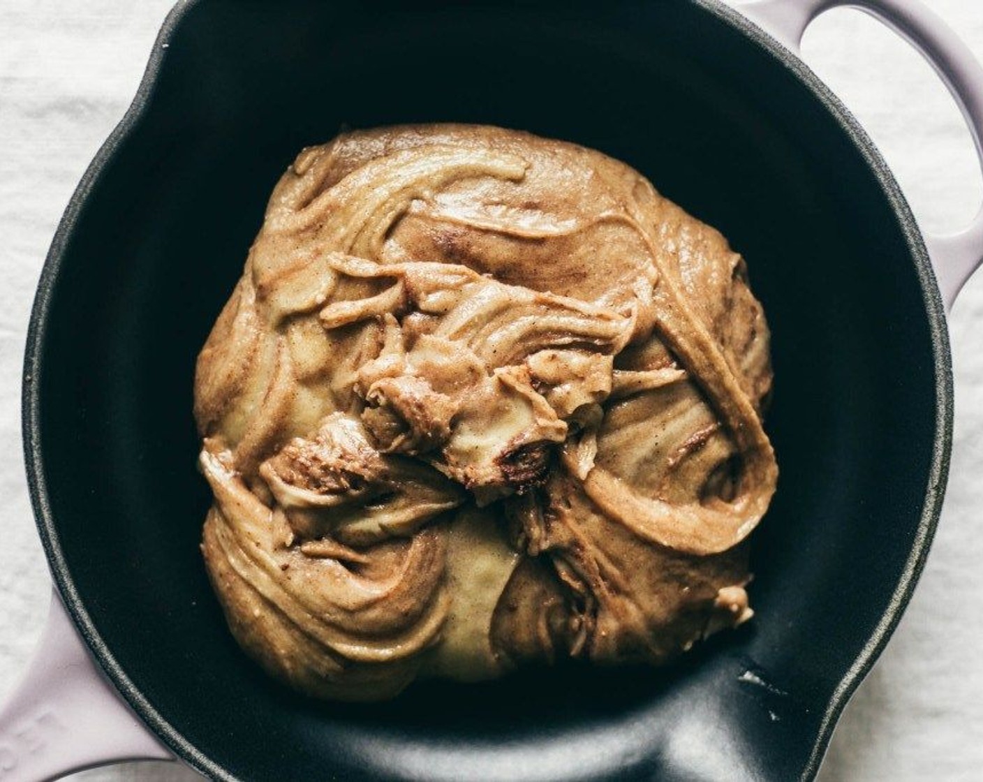 step 3 Sprinkle in the All-Purpose Flour (1 cup), Salt (1/2 tsp), Baking Soda (1/4 tsp), Ground Cardamom (1/4 tsp), and Ground Nutmeg (1/4 tsp). Mix until incorporated. Fold in the Simply Organic Cinnamon, Ground (2 tsp) just until that batter starts to ribbon with cinnamon.