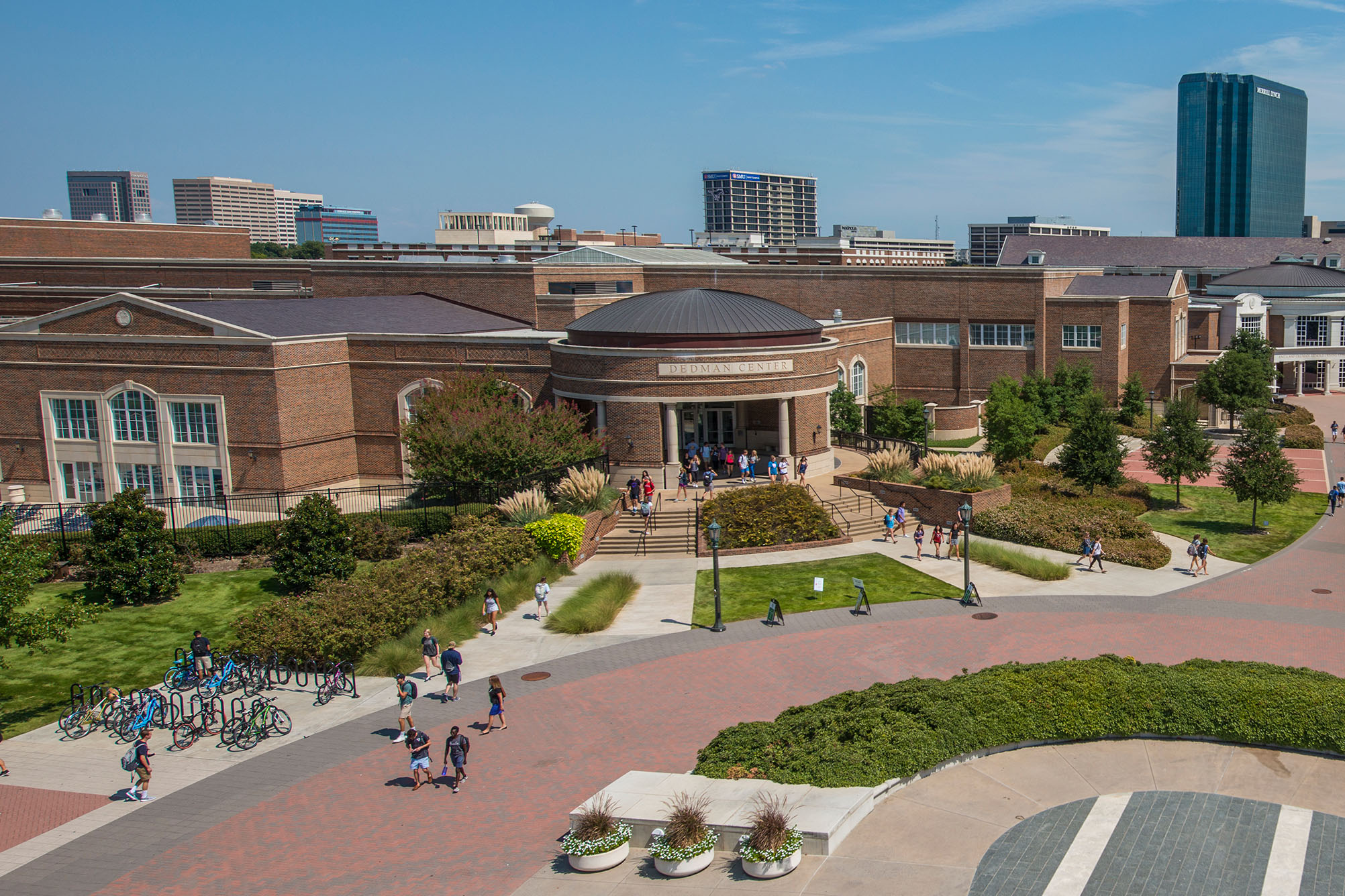 exterior of dedman center for lifetime sports with students walking outside