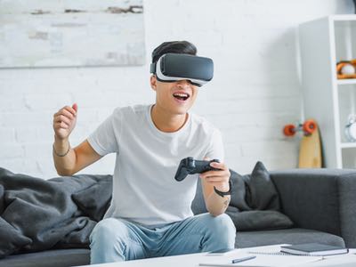 Gamer with VR goggles