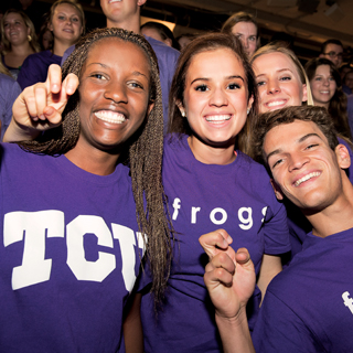 Three diverse students showing the frog hand sign