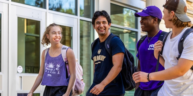 Group of students walking on campus