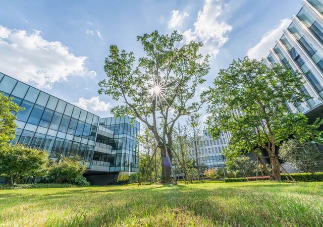 Modern eco city with green trees.