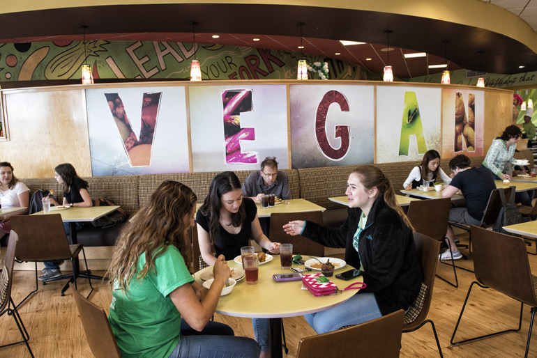 Students at UNT's Vegan restaurant,  Mean Greens