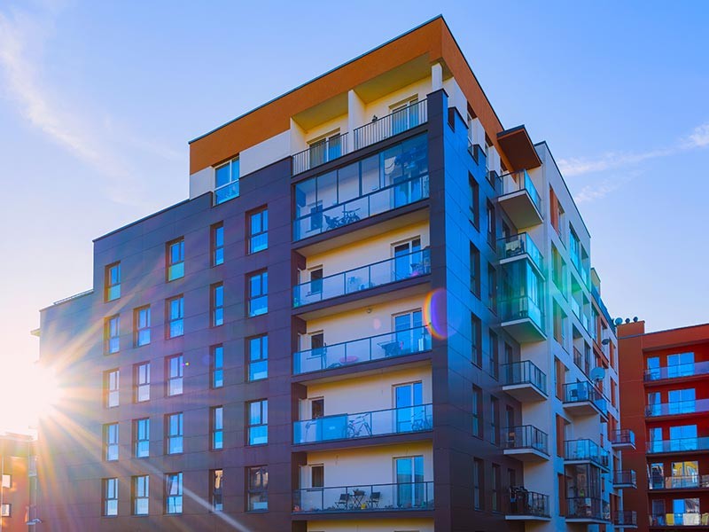 Apartment building at sunset