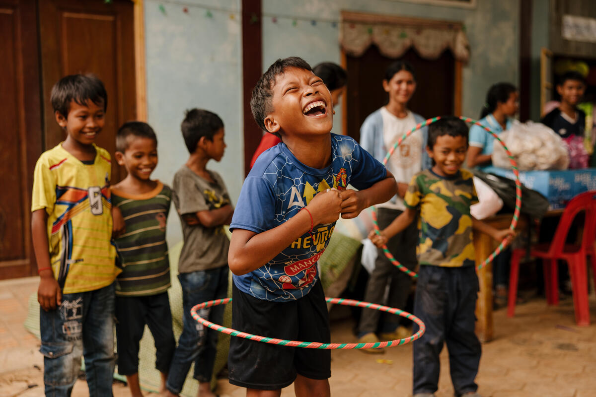 Children playing hula hoops